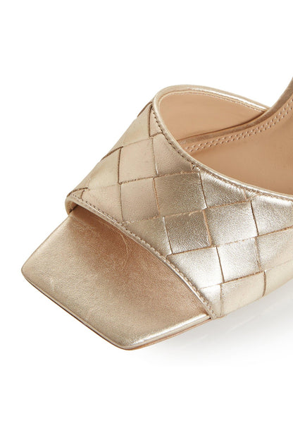 Gold woven open-toe mule sandal upper with stitched grid pattern