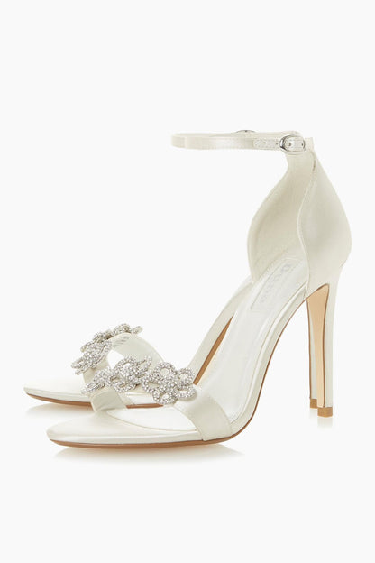 Ivory open-toe heeled sandal with ankle strap and rhinestone strap detail, stiletto heel