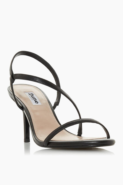 Black strappy heeled sandals with thin ankle straps and open toe