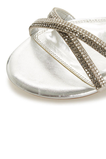 Silver metallic sandal toe with rhinestone strap detail and stitched edge