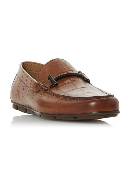 Tan leather loafer with moc-style stitching and black strap detail