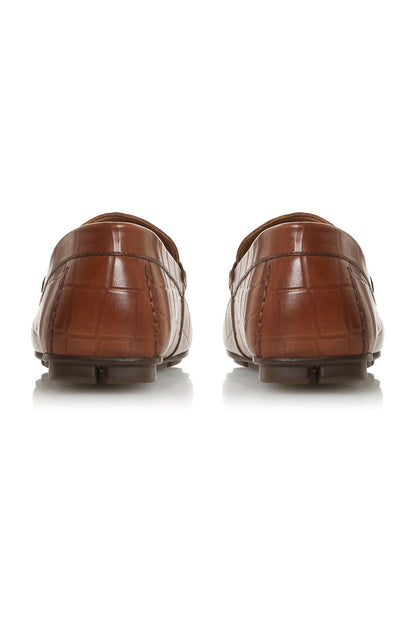 Tan leather loafer, rounded back and textured finish with dark sole