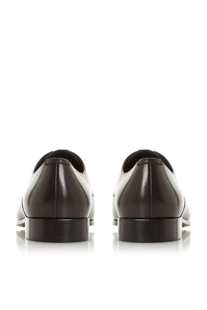 Black leather lace-up shoe back view with low heel and pull tab at collar