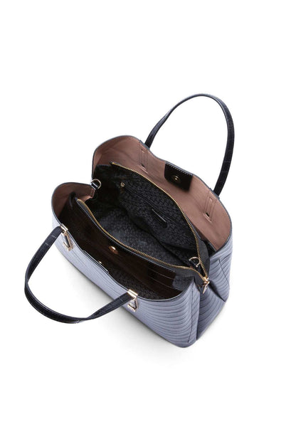 Blue croc-textured mini tote with top handles, zipper closure, and crossbody strap