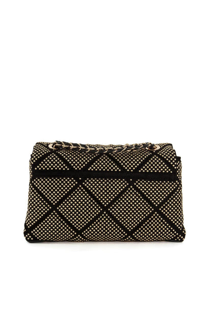 Quilted flap bag with gold dot diamond pattern and chain strap, angled side view