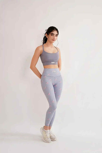 Grey sports bra and leggings set with floral print, full-length leggings