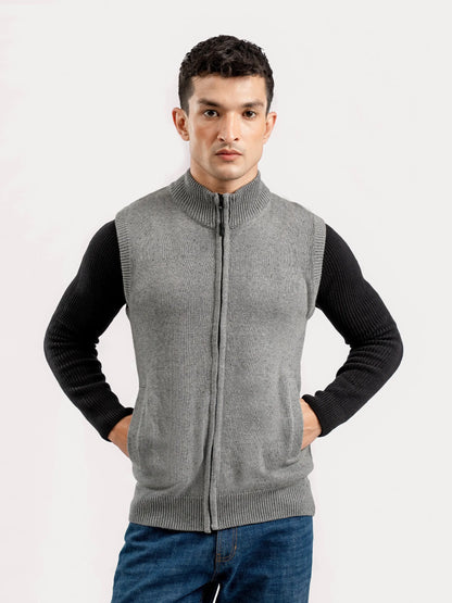 Grey knit zip-front sleeveless vest with stand collar and full-length zipper