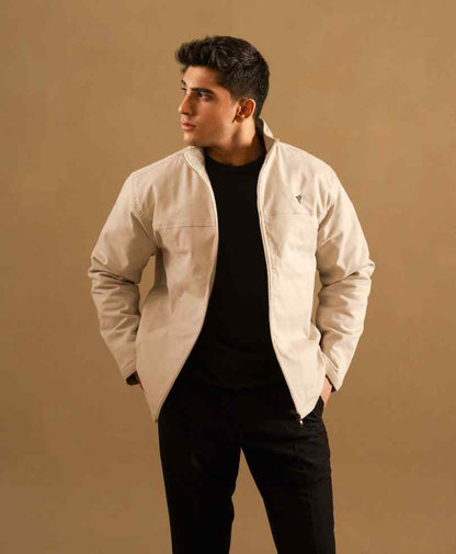 Beige zip-up jacket with stand collar, side view, fitted silhouette