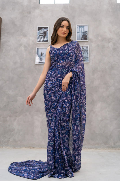 Velour maxi dress with blue paisley print and layered ruffle hem