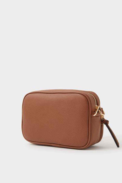 Tan leather-look small crossbody bag with rounded shape and side zip pocket