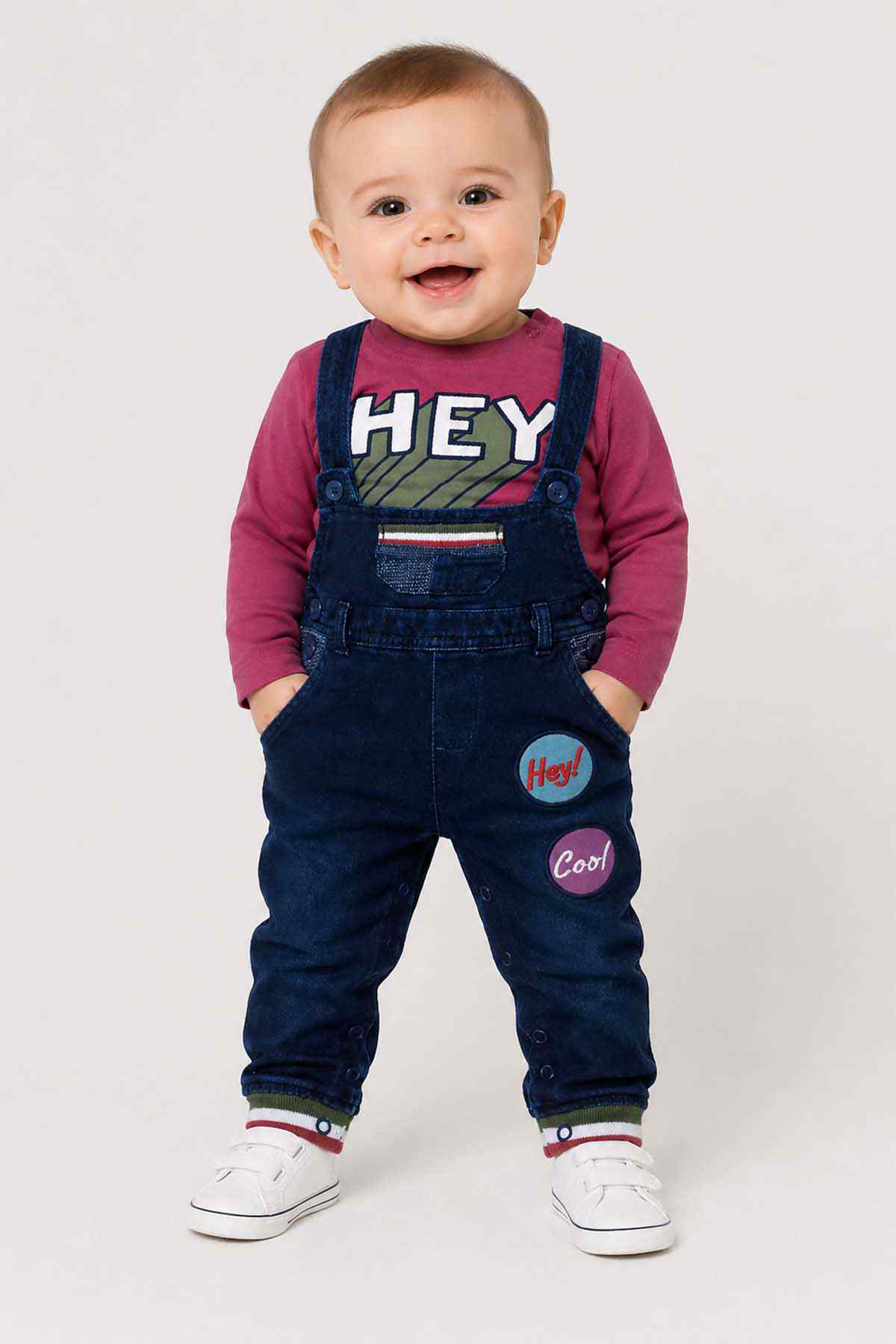 BABYSHOP baby denim overalls with 'HEY' patch over burgundy long-sleeve top