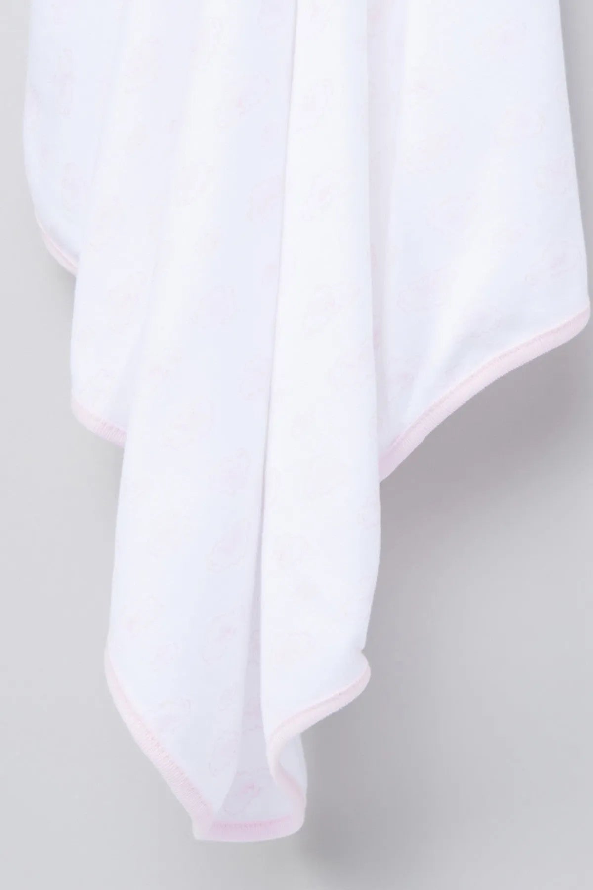 BABYSHOP baby blanket close-up, white fabric with pink stitched trim