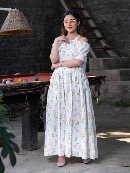 White floral off-shoulder maxi dress with pleated bodice and ankle-length skirt