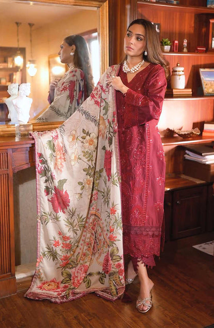 Maroon embroidered dress with cream floral dupatta draped over shoulder