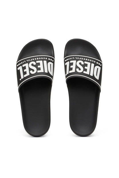 Black slide sandals with DIESEL logo printed on footbed