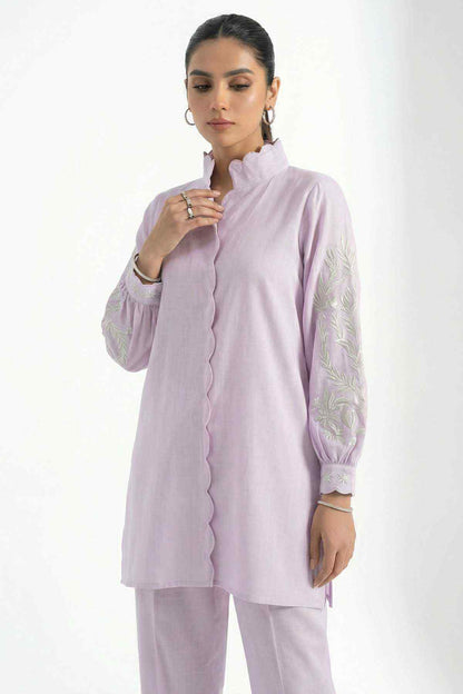 Lilac kurta close-up with stand collar, lace front detailing, and embroidered puff sleeves