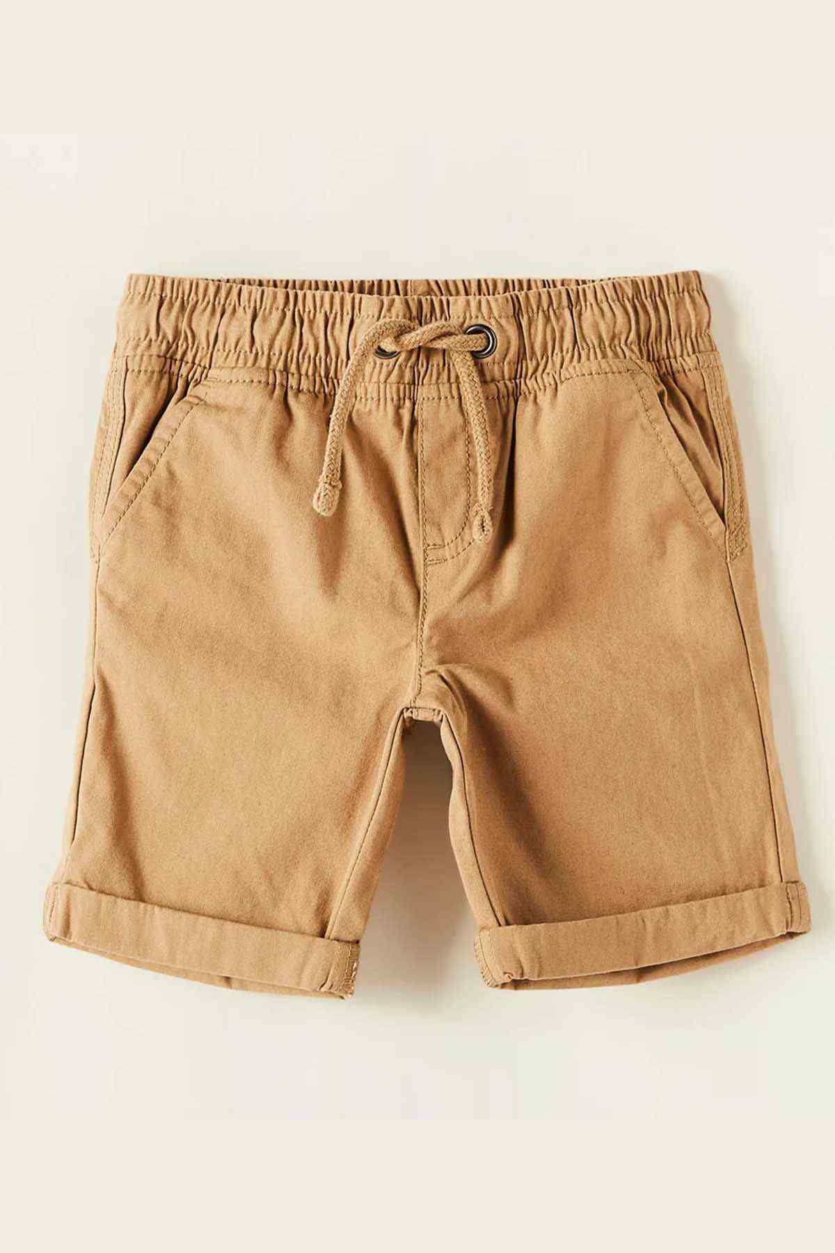 Brown baby shorts with elastic waistband and drawstring, side pockets