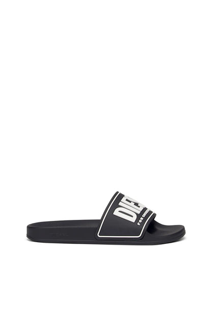 Black slide sandals with DIESEL logo strap and flat rubber sole