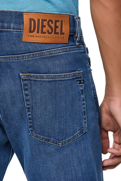 Blue denim jeans back label patch on waistband, front pocket stitching