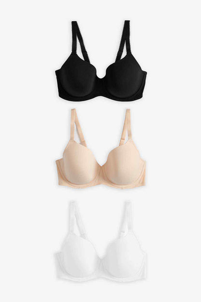 Three-pack underwire bras in black, nude and white with thin adjustable straps