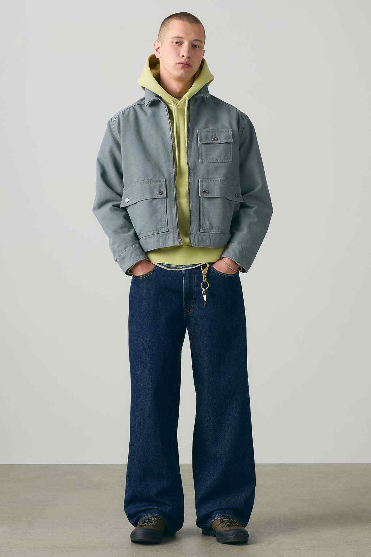 Dark wash denim jeans with wide legs and button-front fly