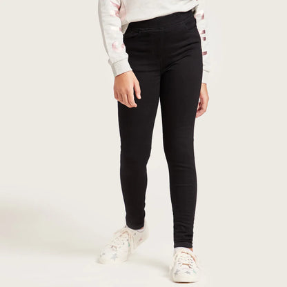 BABYSHOP black skinny leggings, full-length side view