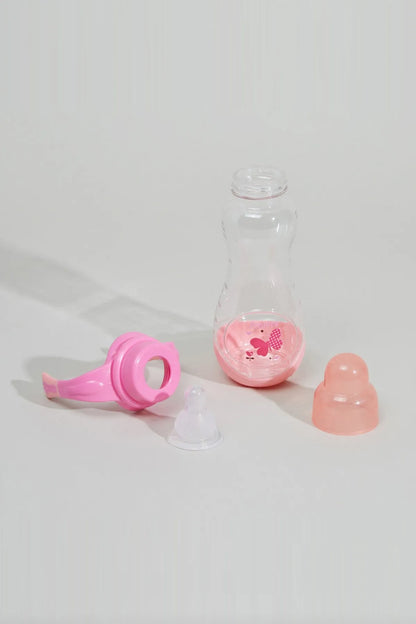 Pink spout cover and clear baby bottle with pink printed hearts, plus spare nipple