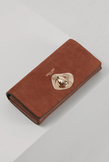 Brown foldover wallet with gold-tone metal clasp and snap closure