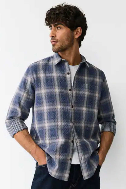 Men’s blue plaid button-up shirt with contrast check cuffs
