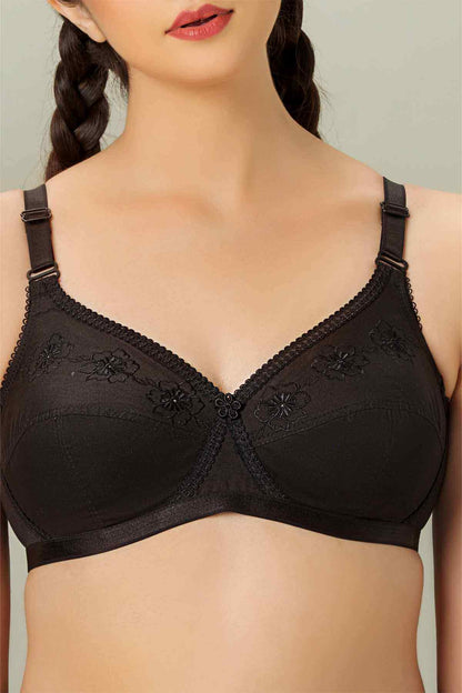 Black balconette bra with scalloped lace trim and embroidered motifs