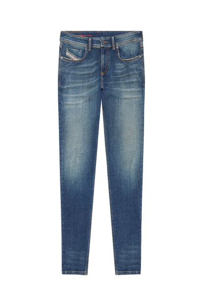 Diesel blue denim jeans laid flat, straight leg with button-and-zip closure