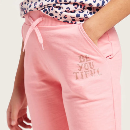 BABYSHOP pink jogger pants with drawstring and "BE YOU LITTLE" front print
