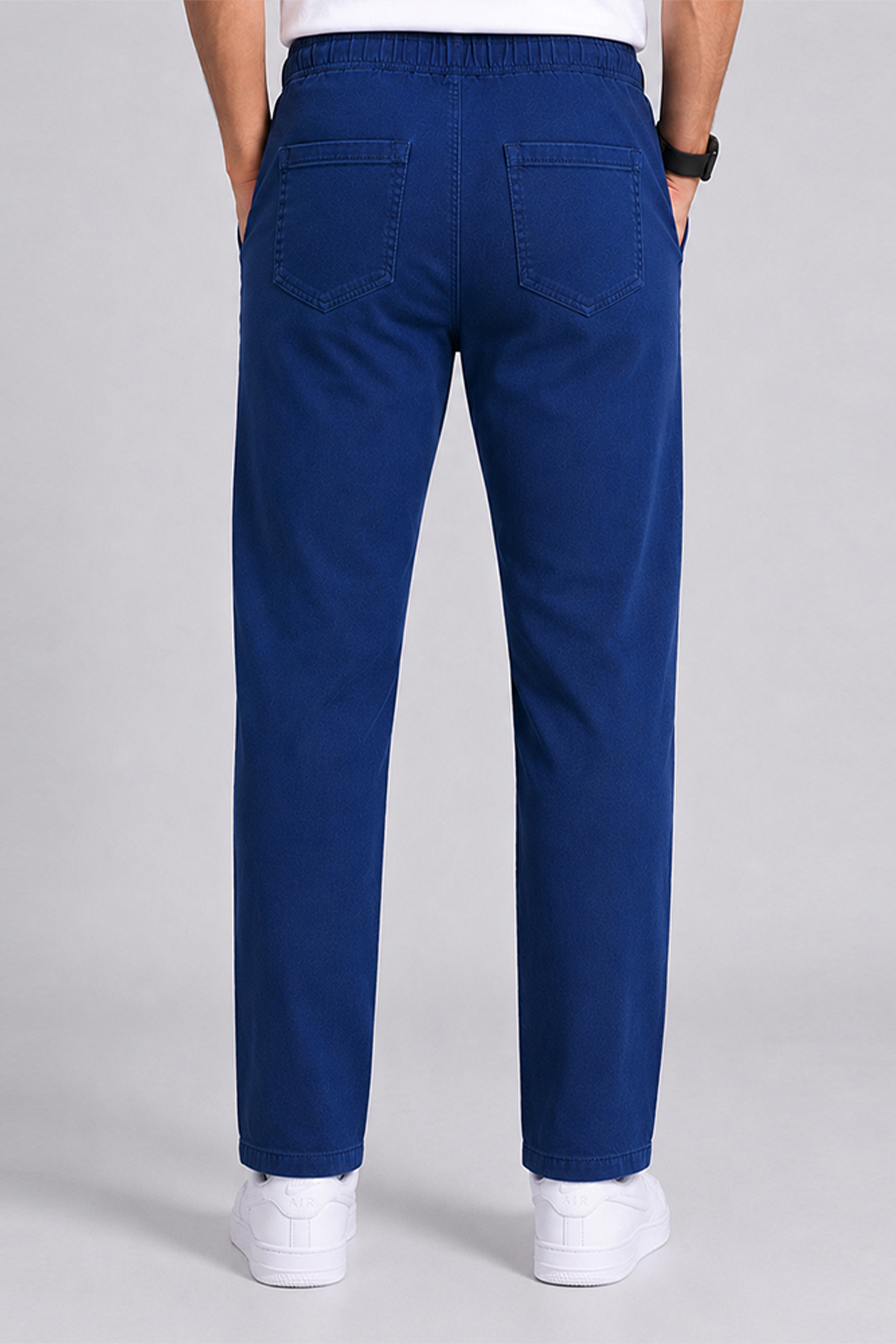 Royal blue chino pants with back welt pockets and straight-leg fit