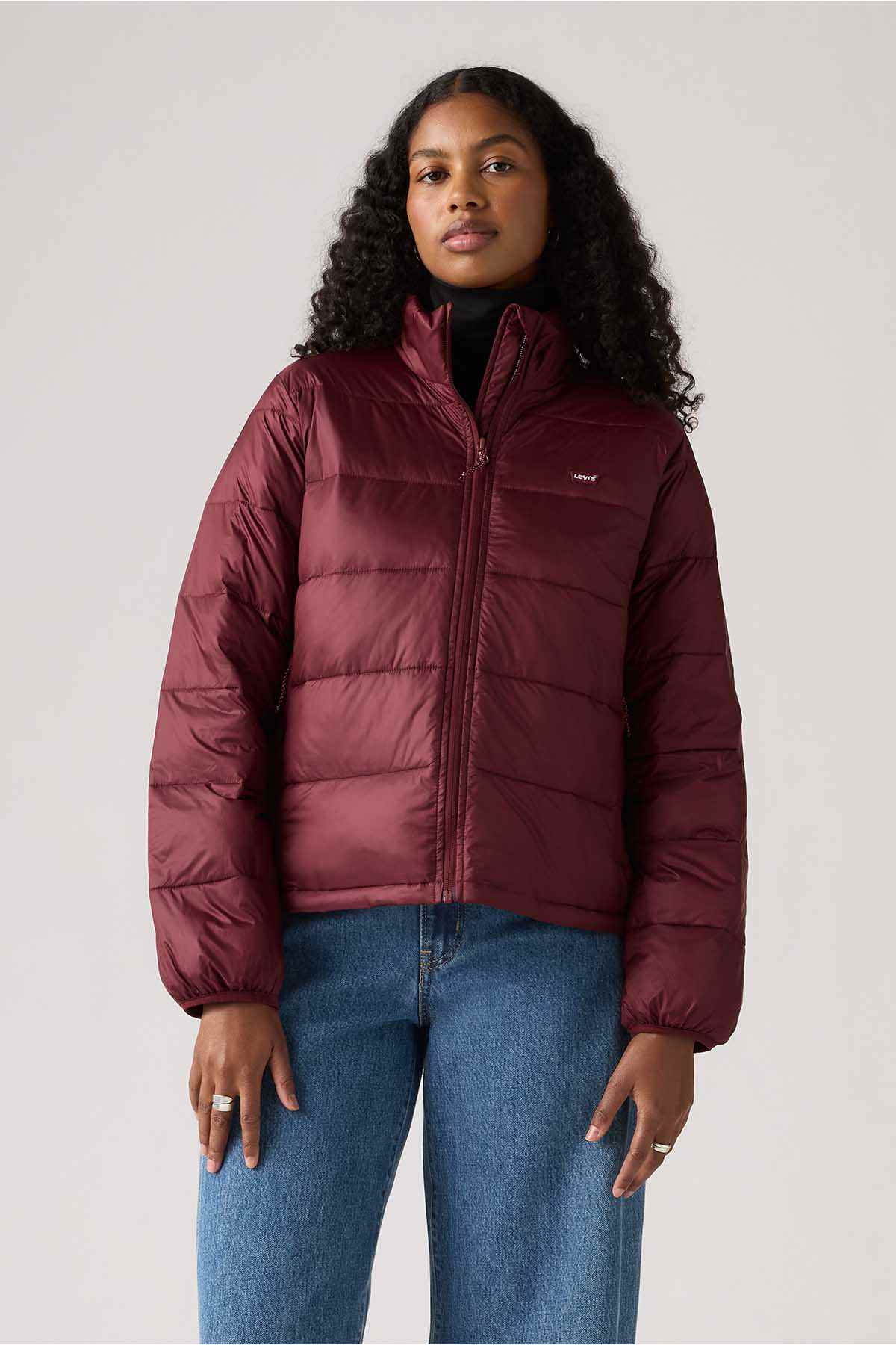 Levi's burgundy puffer jacket with full-zip front and stand collar