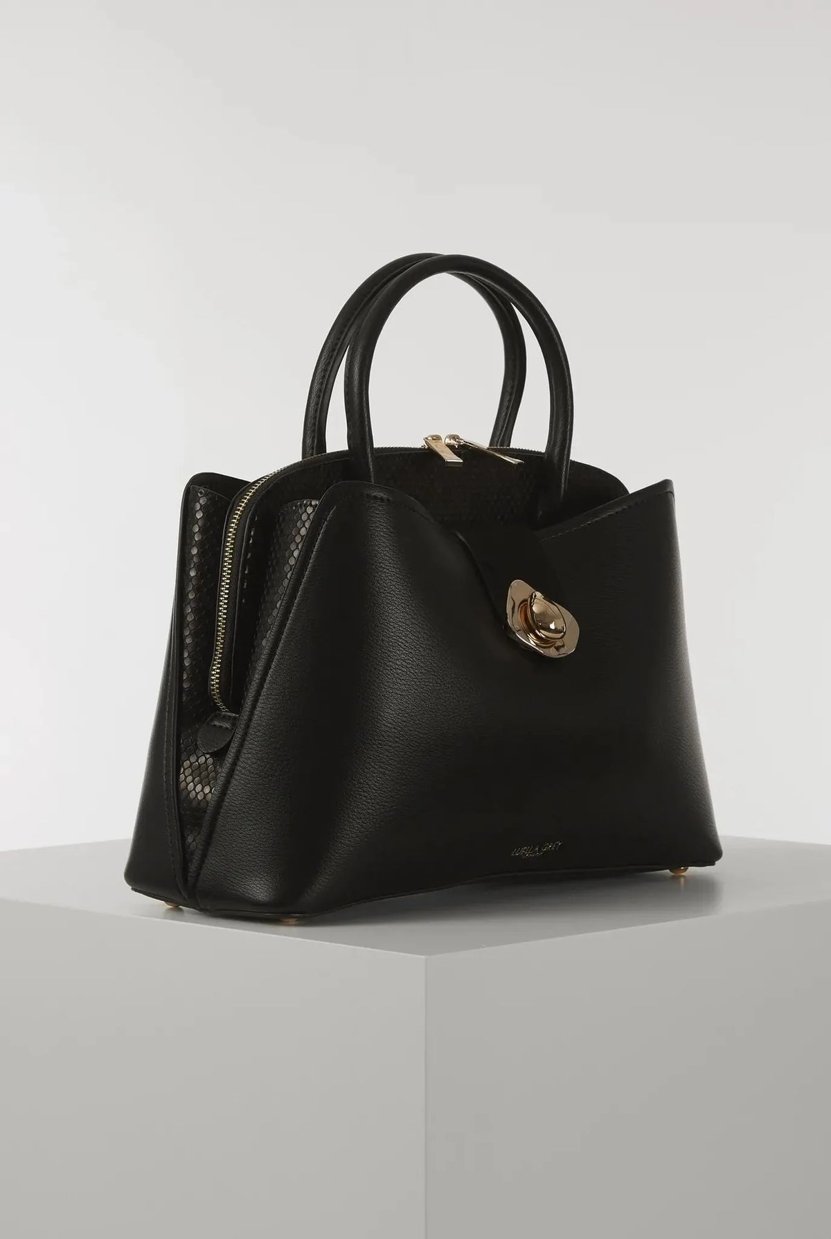 Black handbag with top handles, gold-tone turn-lock clasp, side mesh pocket
