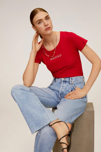 Red fitted T-shirt with MANGO logo text at chest, crew neck.