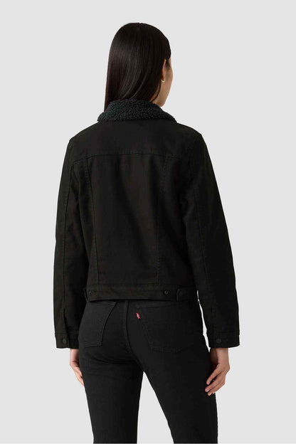 Black denim jacket back view with high textured collar and buttoned cuffs