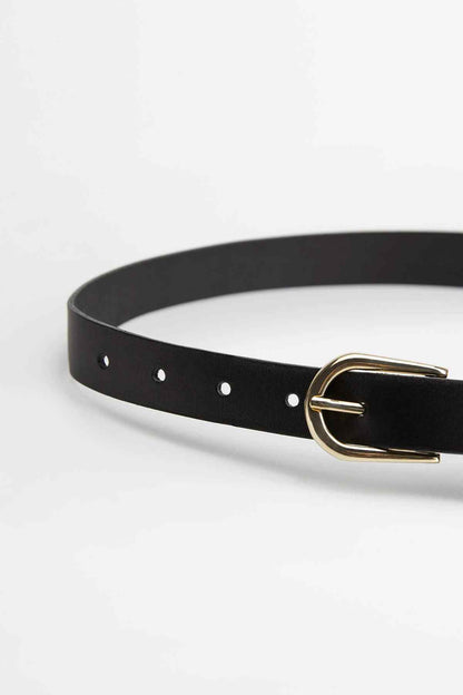 Black belt with round gold-tone buckle and evenly spaced perforation holes