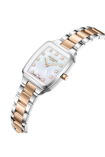 Angled silver and rose gold wristwatch with light patterned face and gold-tone hands