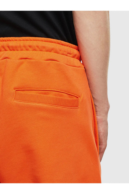 Orange jogger pants with side welt pocket and stitched seam details