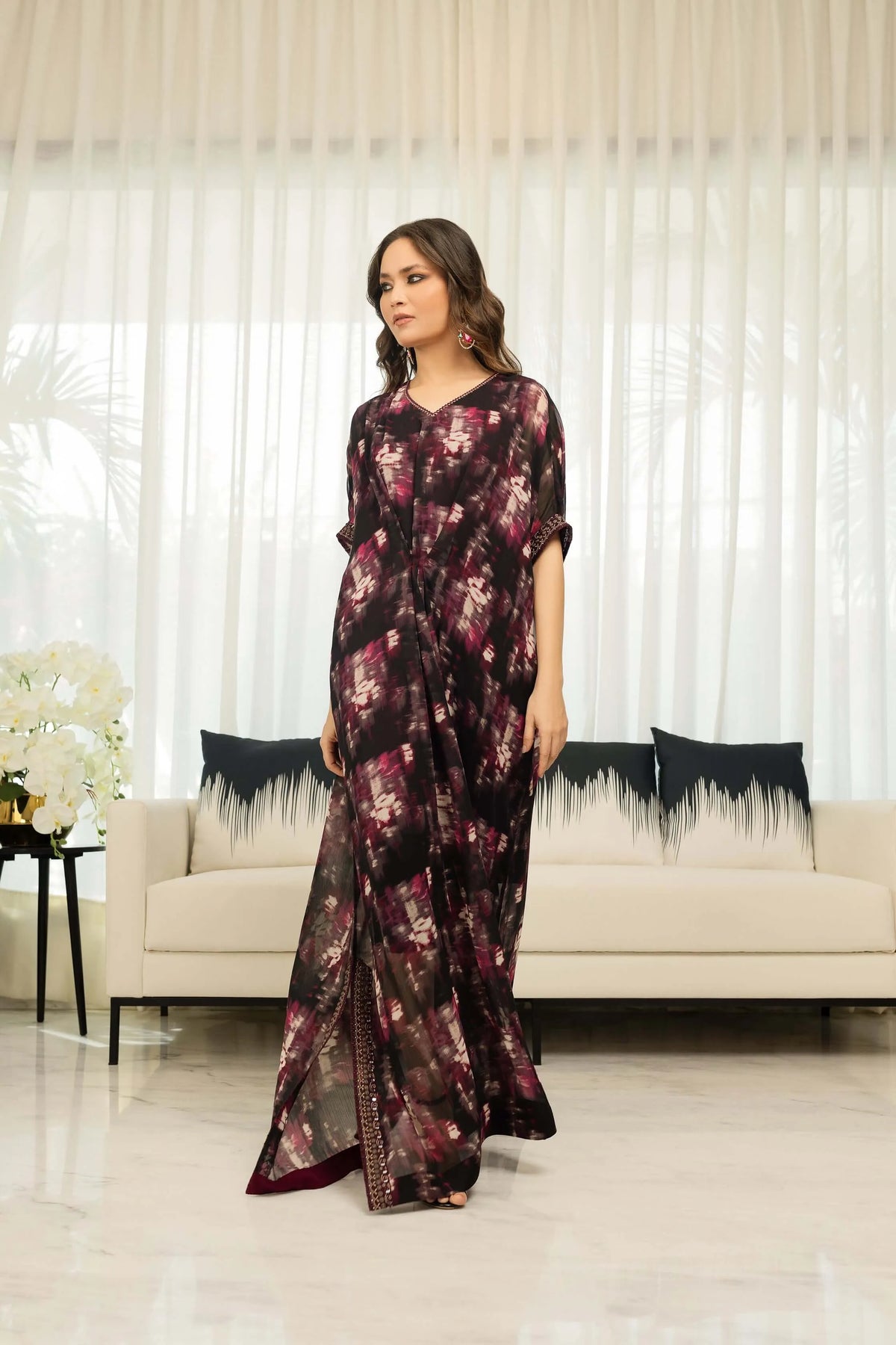 Dark maroon floral maxi dress with short sleeves, round neckline, and slit hem
