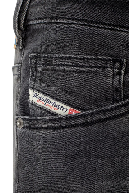 Denim pocket label reading Diesel Industry, dark gray jeans detail