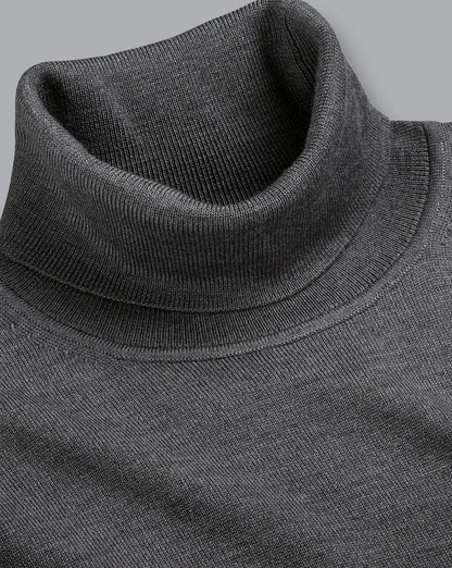 Grey wool knit turtleneck with ribbed collar and neckline detail