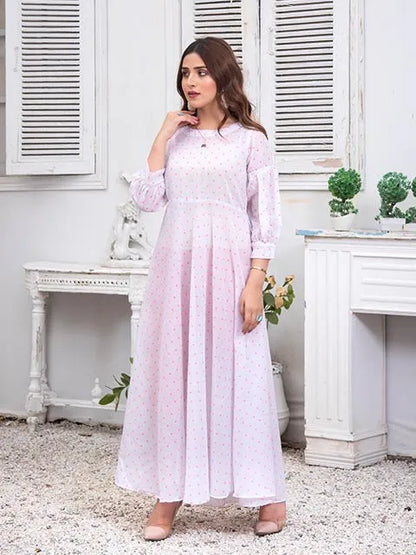 Light pink Nazmina midi dress with long sleeves and tiny dotted pattern, side view