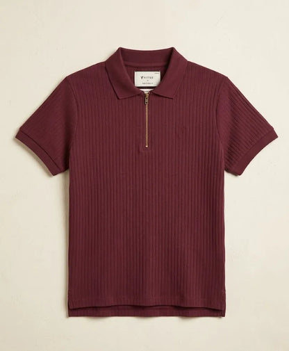 Fitted maroon ribbed knit polo shirt flat lay with short sleeves and half-zip front