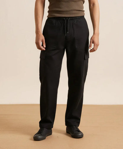 Fitted black cargo pants with drawstring waist and two front cargo pockets