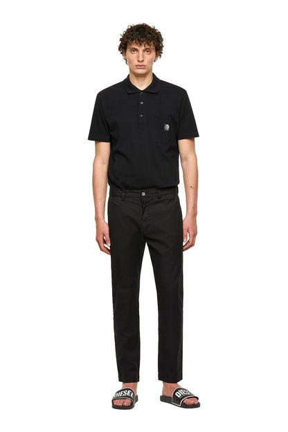 Black straight-leg trousers on model with belt loops and button closure