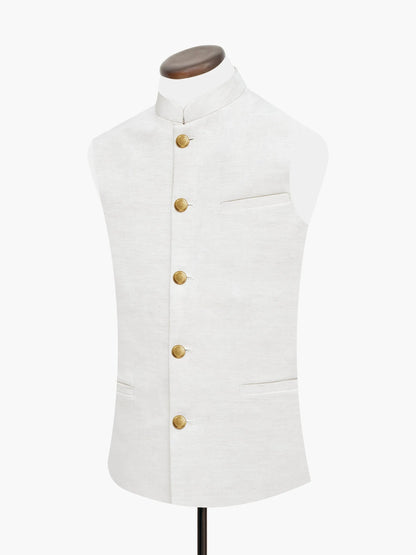 Beige linen-viscose sleeveless vest with gold button placket and stand collar