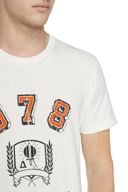White crewneck T-shirt close-up of '7' and '8' orange-outlined graphics