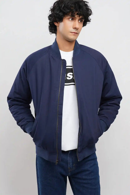 Navy zip-up jacket with full front zipper, ribbed hem and cuffs